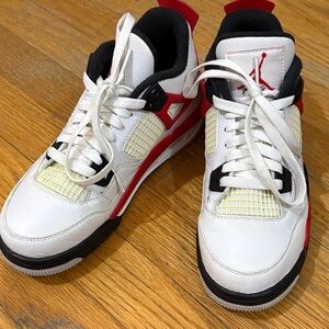 Red and white cement retro Jordan 4’s